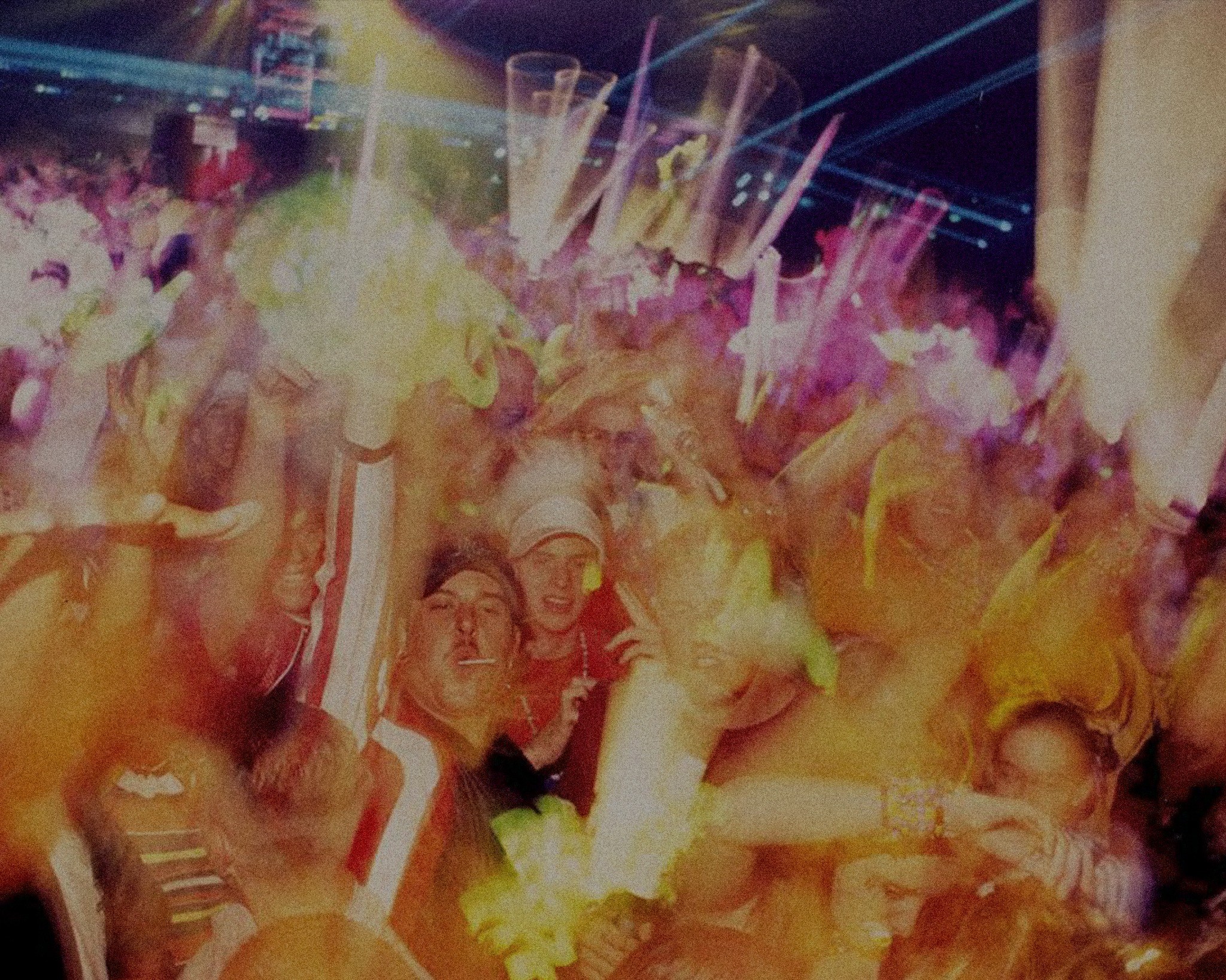 Overexposed rave crowd