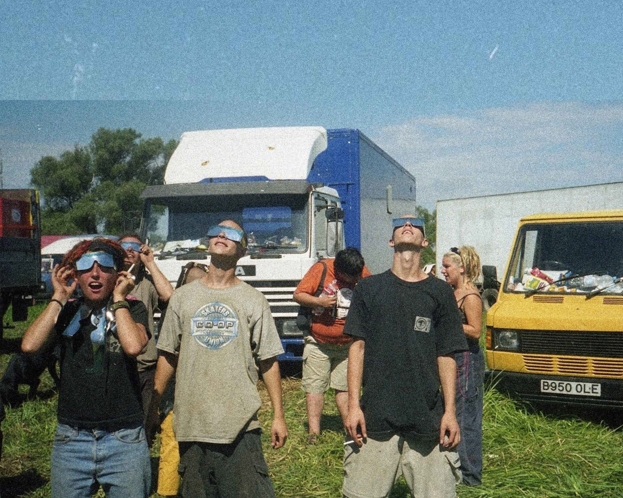 Ravers looking at eclipse